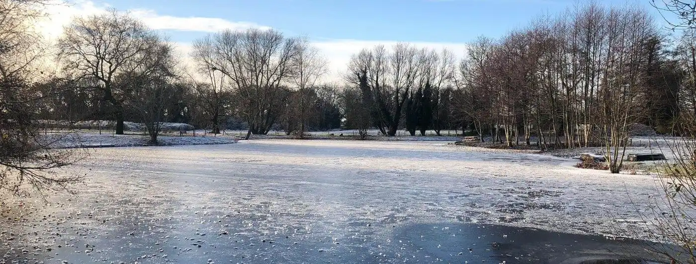 frozen lake during winter at the old rectory